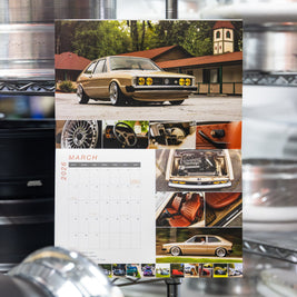 Dustin Shaw's Mk1 VW Scirocco 1.8T on Alter-mann wheels, surrounded by Alter-mann wheels, featured in the March spread of the 2026 More Than More VW Calendar.