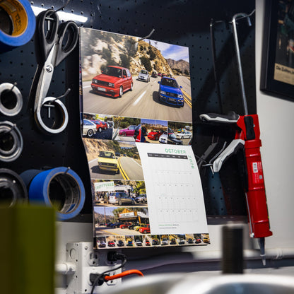 The October spread of More Than More's 2026 VW Wall Calendar, featuring photos and a rolling shot from  the Treffpunks Retreat in California.